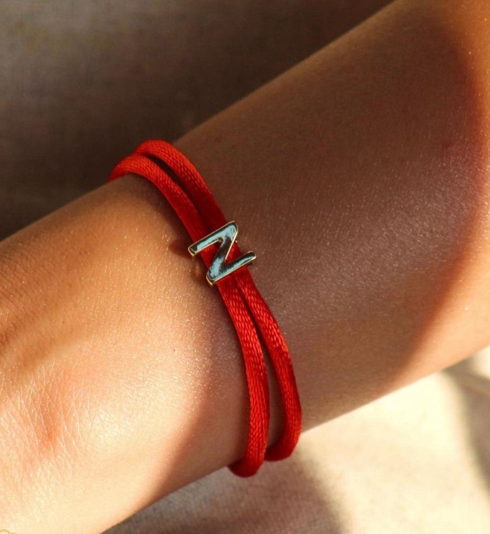 Customized letter with colored thread